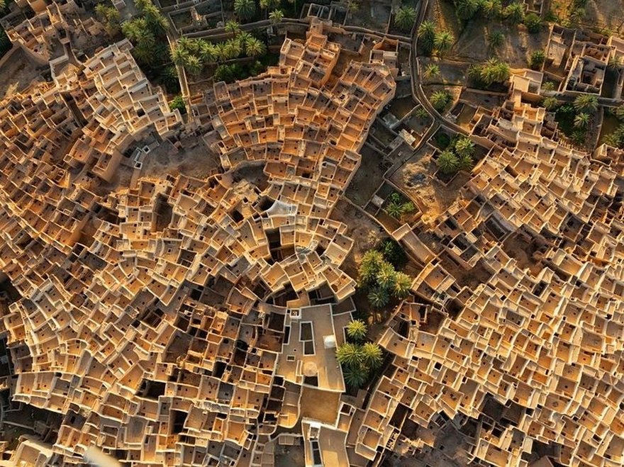 Traditional mud-brick-and-palm houses, packed together like a honeycomb