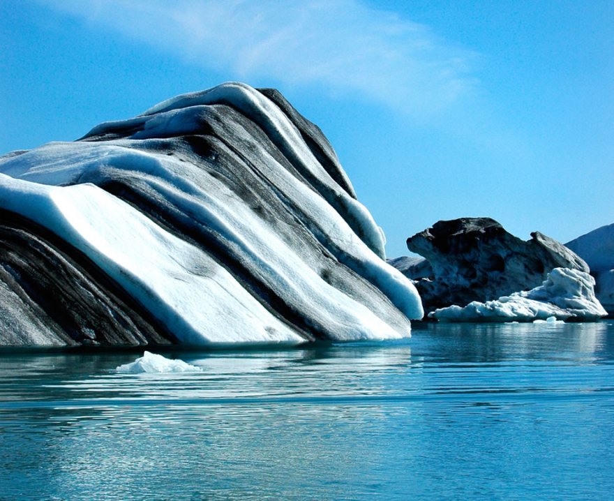 Iceberg with black stripes - Antarctica